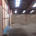 large warehouse bare brick walls to be plastered