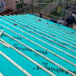 prep roof for new tiles.