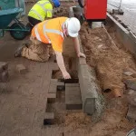 laying ground bricks in forecourt