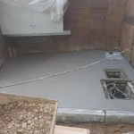 cement laid with manhole covers.