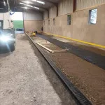 laying drainage in warehouse