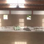 plastering wall in warehouse