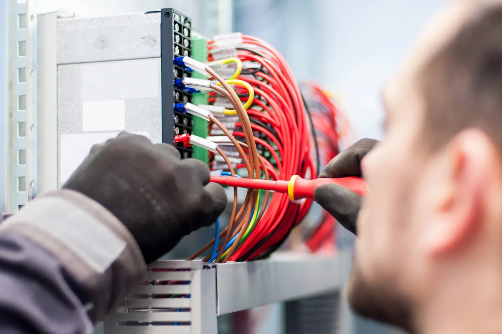 Electrician fixing wires